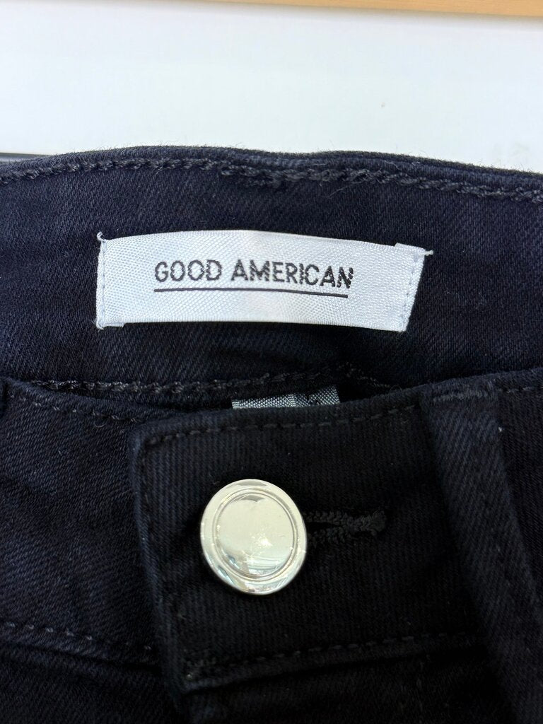 Good American Black High-Waisted Jeans with Grommet Details