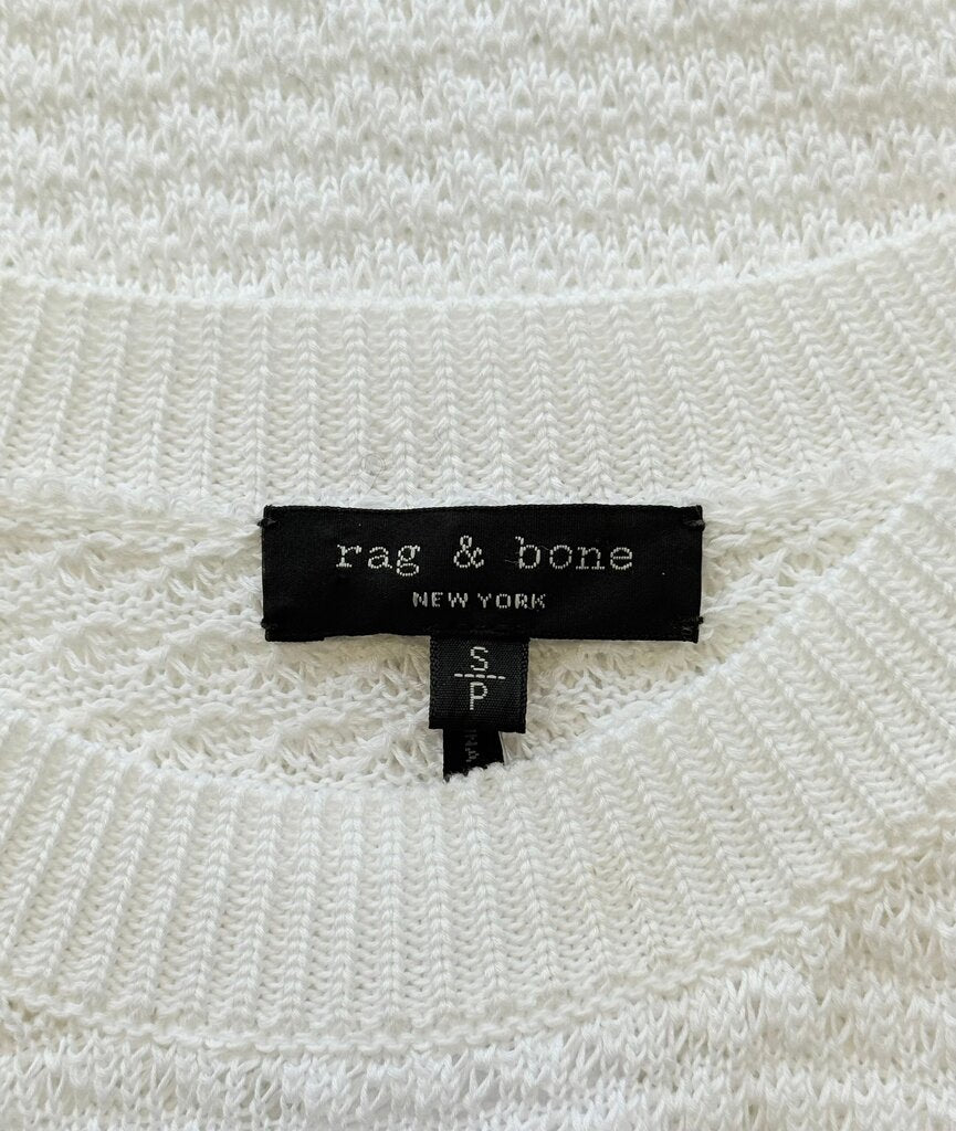 Rag & Bone label on a textured white fabric background