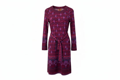 Purple patterned dress on a hanger against a white background