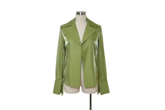 Green jacket on a hanger against a white background