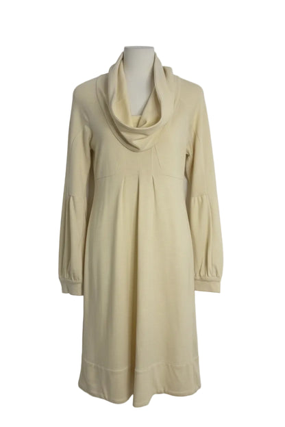 Beige long-sleeve dress on a hanger against a white background